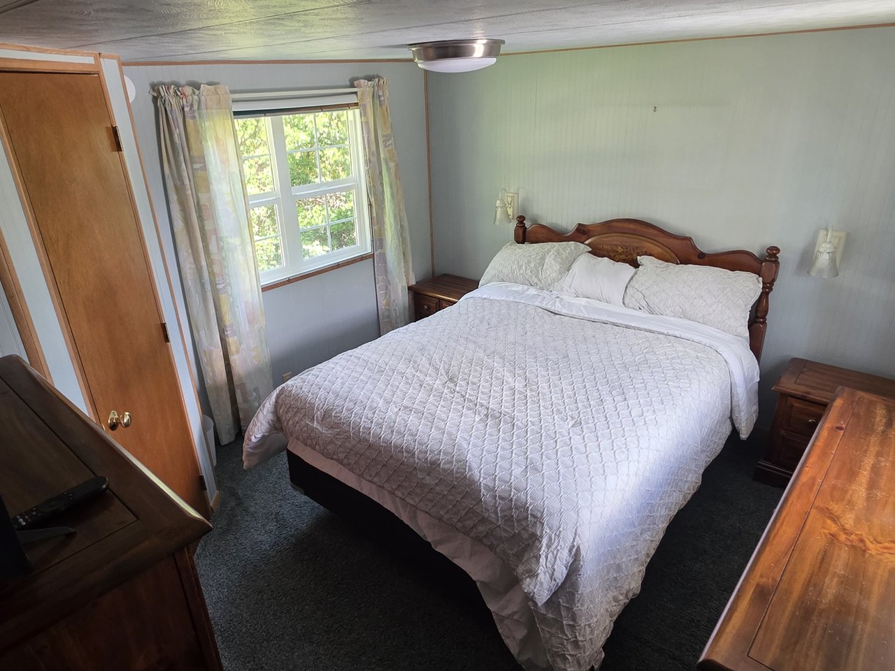 Primary bedroom with queen bed