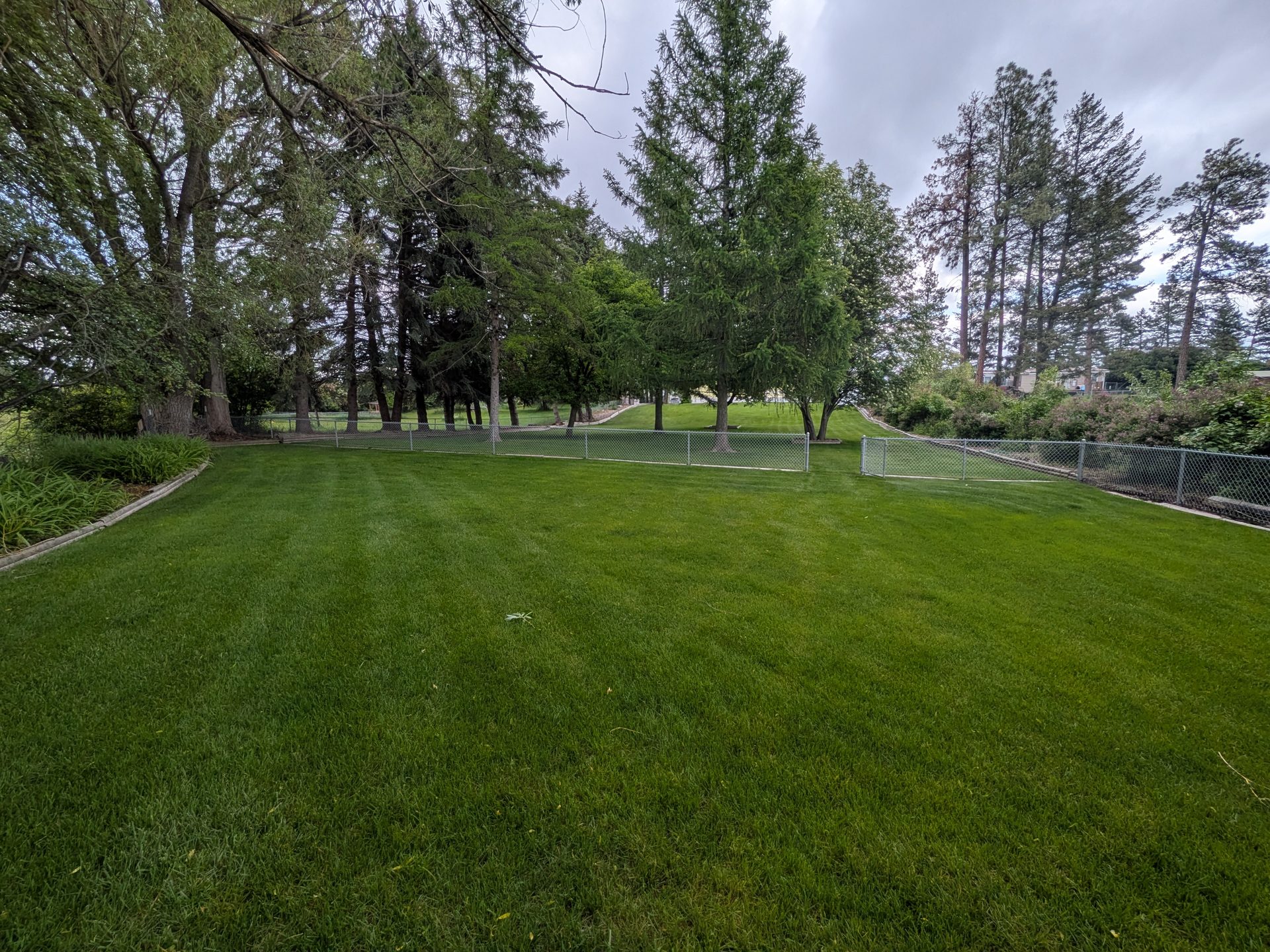 A flat, open lawn easy for strollers and slow walks